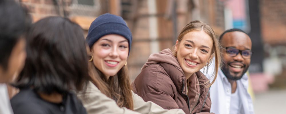 Group of youth sitting outside
